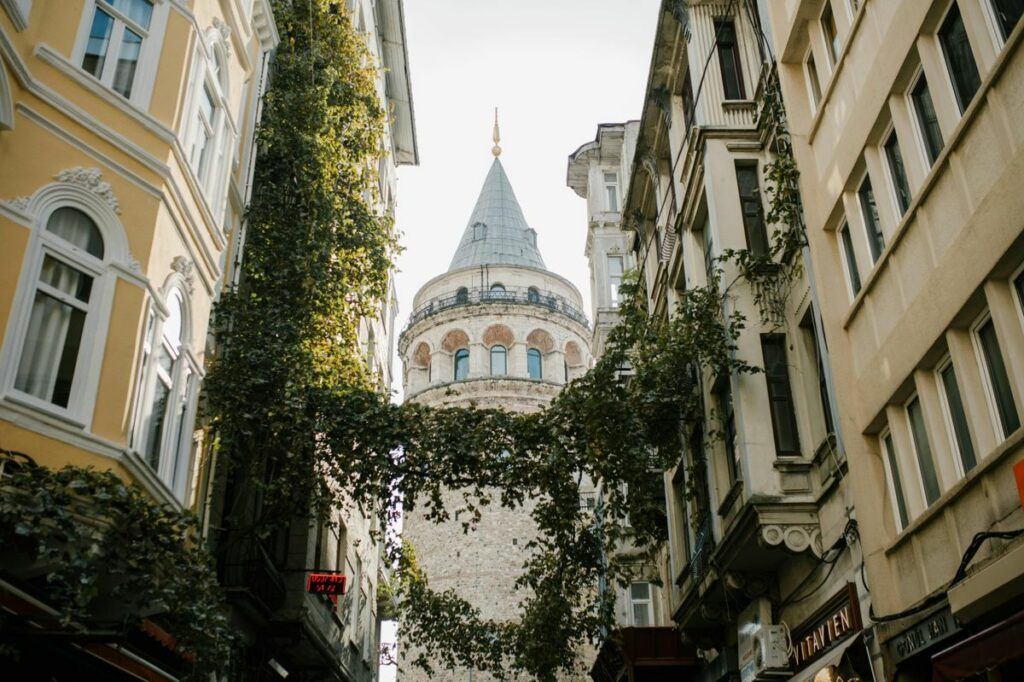 View of Galata Tower framed by old city buildings in Istanbul